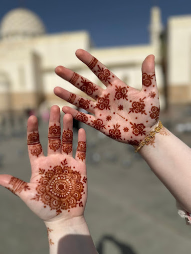 Mandala henna design on a palm