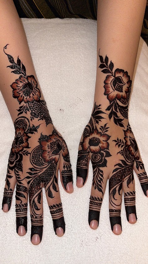 Full black bridal mehndi on both hands